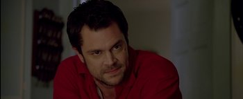 Movie still from “The Dukes of Hazzard” (2005), directed by Jay Chandrasekhar – A person wearing a red shirt; Close Up shot, Over the shoulder angle