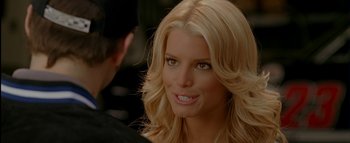 Movie still from “The Dukes of Hazzard” (2005), directed by Jay Chandrasekhar – A person with blonde hair; Close Up shot, Over the shoulder angle