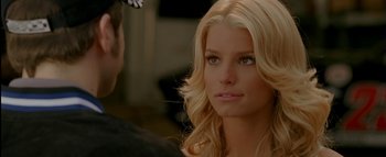 Movie still from “The Dukes of Hazzard” (2005), directed by Jay Chandrasekhar – A woman with long blonde hair; Close Up shot, Over the shoulder angle