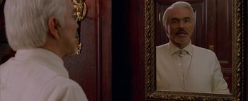 Movie still from “The Dukes of Hazzard” (2005), directed by Jay Chandrasekhar – A man looking at himself in the mirror; Close Up shot, Over the shoulder angle