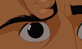 Movie still from “The Emperor's New Groove” (2000), directed by Mark Dindal – An illustration of a person's eye and hand; Extreme Close Up shot, Overhead angle