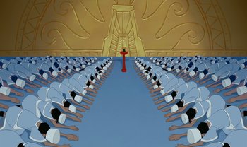 Movie still from “The Emperor's New Groove” (2000), directed by Mark Dindal – An illustration of a crowd of people sitting in rows in front of a cross; Extreme Wide shot, High angle