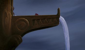 Movie still from “The Emperor's New Groove” (2000), directed by Mark Dindal – A wooden bridge with water coming out of it; Extreme Wide shot, High angle