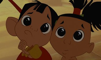 Movie still from “The Emperor's New Groove” (2000), directed by Mark Dindal – A couple of kids that are standing next to each other; Close Up shot, Low angle