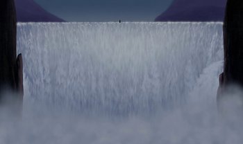 Movie still from “The Emperor's New Groove” (2000), directed by Mark Dindal – A man standing on top of a water fall; Extreme Wide shot, Low angle