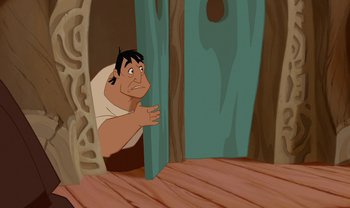 Movie still from “The Emperor's New Groove” (2000), directed by Mark Dindal – An animated picture of a man peeking through a door; Medium shot, Low angle