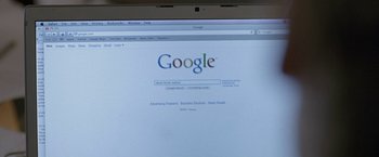 Movie still from “The End of the Tour” (2015), directed by James Ponsoldt – A computer screen showing the google homepage; Extreme Close Up shot, High angle