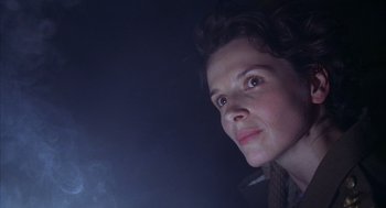 Movie still from “The English Patient” (1996), directed by Anthony Minghella – A person looking up at the sky; Close Up shot, Low angle