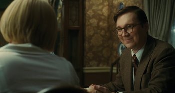 Movie still from “The Fabelmans” (2022), directed by Steven Spielberg – A man and a woman are sitting at a table; Close Up shot, Over the shoulder angle