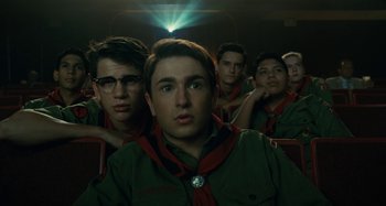 Movie still from “The Fabelmans” (2022), directed by Steven Spielberg – A group of young men sitting in front of each other; Medium shot, Low angle