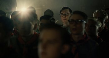 Movie still from “The Fabelmans” (2022), directed by Steven Spielberg – A group of people sitting in a room; Medium shot, Over the shoulder angle