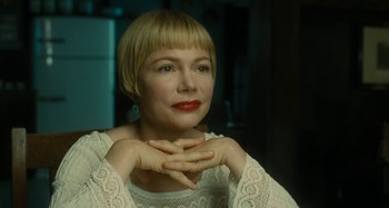 Movie still from “The Fabelmans” (2022), directed by Steven Spielberg – A woman sitting down with her hands in her mouth; Close Up shot, Over the shoulder angle