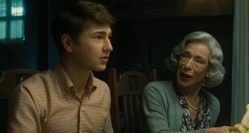 Movie still from “The Fabelmans” (2022), directed by Steven Spielberg – A man and a woman sitting next to each other on a bench; Close Up shot, Over the shoulder angle