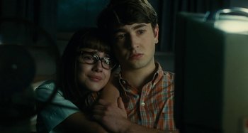 Movie still from “The Fabelmans” (2022), directed by Steven Spielberg – A man and a woman sitting next to each other; Close Up shot, Over the shoulder angle