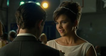 Movie still from “The Fabelmans” (2022), directed by Steven Spielberg – A man and a woman are looking at one another; Close Up shot, Over the shoulder angle