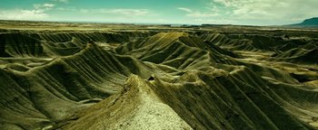 Movie still from “Point Break” (2015), directed by Ericson Core – Extreme Wide shot, High angle