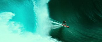 Movie still from “Point Break” (2015), directed by Ericson Core – Extreme Wide shot, Low angle