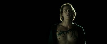 Movie still from “Point Break” (2015), directed by Ericson Core – Medium shot, Overhead angle