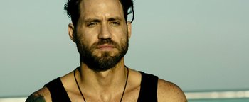 Movie still from “Point Break” (2015), directed by Ericson Core – Close Up shot, Low angle