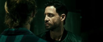 Movie still from “Point Break” (2015), directed by Ericson Core – Close Up shot, Over the shoulder angle