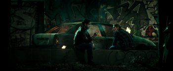 Movie still from “Point Break” (2015), directed by Ericson Core – Wide shot, Over the shoulder angle