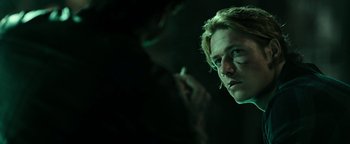 Movie still from “Point Break” (2015), directed by Ericson Core – Close Up shot, Over the shoulder angle