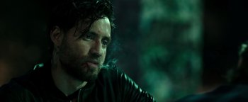 Movie still from “Point Break” (2015), directed by Ericson Core – Close Up shot, Over the shoulder angle