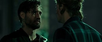 Movie still from “Point Break” (2015), directed by Ericson Core – Close Up shot, Over the shoulder angle