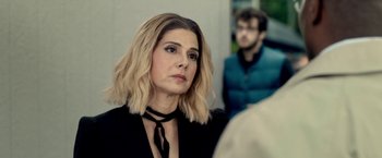 Movie still from “The First Purge” (2018), directed by Gerard McMurray – A person wearing a black shirt; Close Up shot, Over the shoulder angle