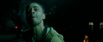 Movie still from “The First Purge” (2018), directed by Gerard McMurray – A person looking up at the sky; Close Up shot, Low angle