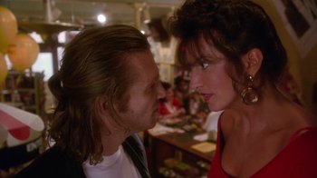 Movie still from “The Fisher King” (1991), directed by Terry Gilliam – A man and a woman face to face in a restaurant; Close Up shot, Over the shoulder angle