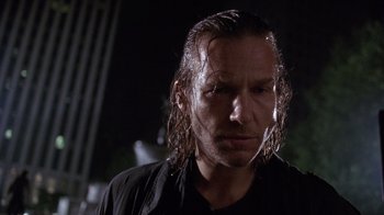 Movie still from “The Fisher King” (1991), directed by Terry Gilliam – A person with wet hair; Close Up shot, Low angle