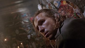 Movie still from “The Fisher King” (1991), directed by Terry Gilliam – A person with wet hair; Close Up shot, Low angle