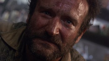 Movie still from “The Fisher King” (1991), directed by Terry Gilliam – A person with a beard; Close Up shot, Low angle