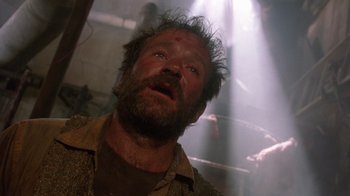 Movie still from “The Fisher King” (1991), directed by Terry Gilliam – A person looking up at the sky; Close Up shot, Low angle
