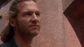 Movie still from “The Fisher King” (1991), directed by Terry Gilliam – A person with a bruise on his face; Close Up shot, Low angle