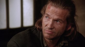 Movie still from “The Fisher King” (1991), directed by Terry Gilliam – A person wearing a jacket; Close Up shot, Over the shoulder angle