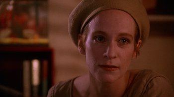 Movie still from “The Fisher King” (1991), directed by Terry Gilliam – A person wearing a hat; Close Up shot, Over the shoulder angle