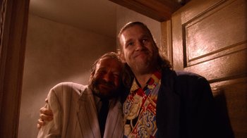 Movie still from “The Fisher King” (1991), directed by Terry Gilliam – A couple of men standing next to each other; Close Up shot, Low angle