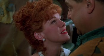 Movie still from “The Flintstones” (1994), directed by Brian Levant – A woman's face and a man's face; Close Up shot, Over the shoulder angle