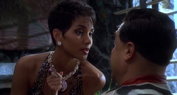 Movie still from “The Flintstones” (1994), directed by Brian Levant – A woman talking to a man; Close Up shot, Over the shoulder angle