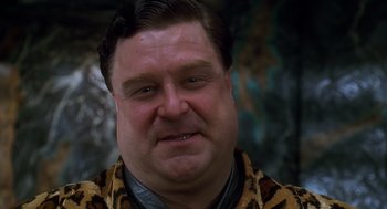 Movie still from “The Flintstones” (1994), directed by Brian Levant – A person wearing a jacket; Close Up shot, Low angle