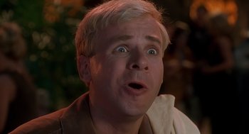 Movie still from “The Flintstones” (1994), directed by Brian Levant – A person with a surprised look on his face; Close Up shot, Low angle