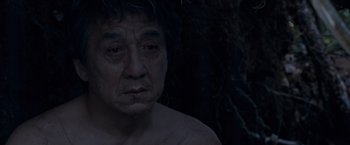 Movie still from “The Foreigner” (2017), directed by Martin Campbell – A man's face in the dark; Close Up shot, High angle