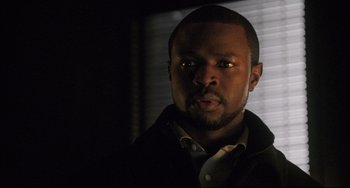 Movie still from “The Fountain” (2006), directed by Darren Aronofsky – A person wearing a jacket; Close Up shot, Over the shoulder angle