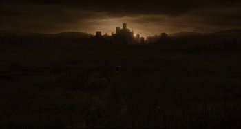 Movie still from “The Fountain” (2006), directed by Darren Aronofsky – A person riding a horse in a field at night; Extreme Wide shot, High angle