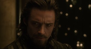 Movie still from “The Fountain” (2006), directed by Darren Aronofsky – A person with a beard; Close Up shot, Over the shoulder angle