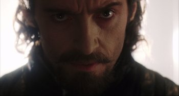 Movie still from “The Fountain” (2006), directed by Darren Aronofsky – A person with a beard; Close Up shot, Over the shoulder angle