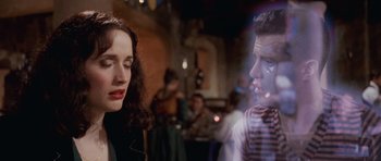 Movie still from “The Frighteners” (1996), directed by Peter Jackson – A man and a woman are standing next to each other; Close Up shot, Over the shoulder angle