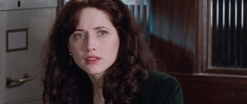 Movie still from “The Frighteners” (1996), directed by Peter Jackson – A person with long curly hair; Close Up shot, Over the shoulder angle